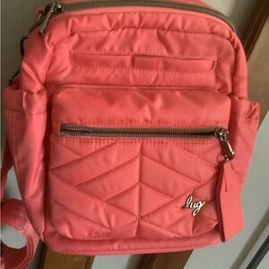 Lug ALPINE medium-sized crossbody bag w RFID. Watermelon/coral color.